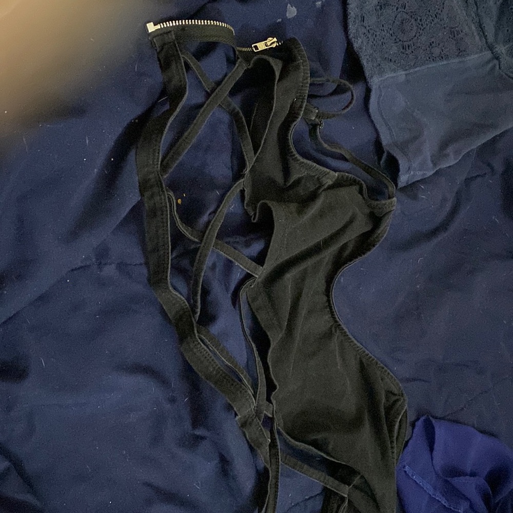 Not sure tank top. Skinny straps with open front and zipper. Black. Size XS.